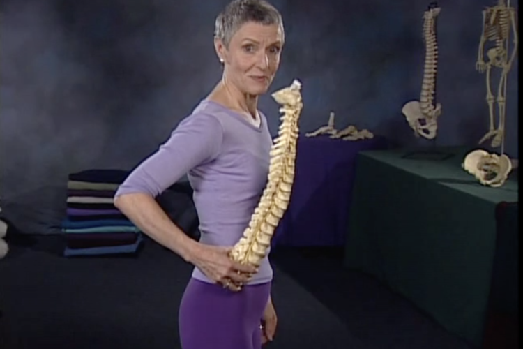 Jean Couch holding a spine