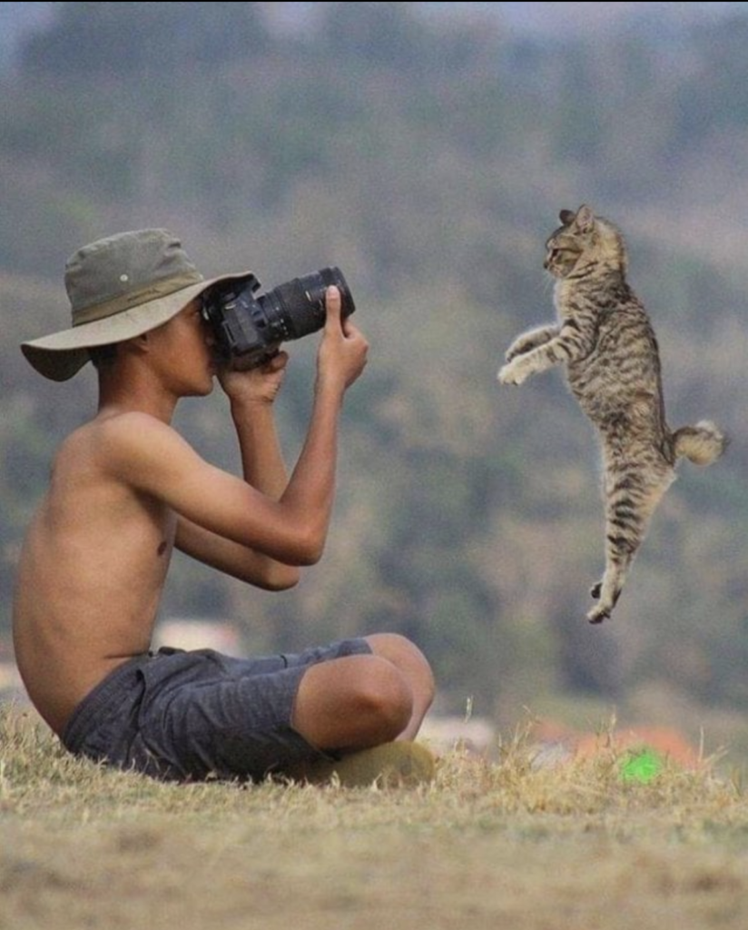 boy with lumbar hump and cat