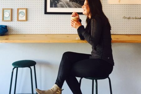 cross-leg sitting in coffee shop