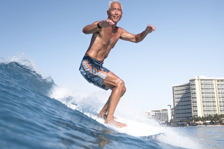 Original Alignment and Aging senior man surfing