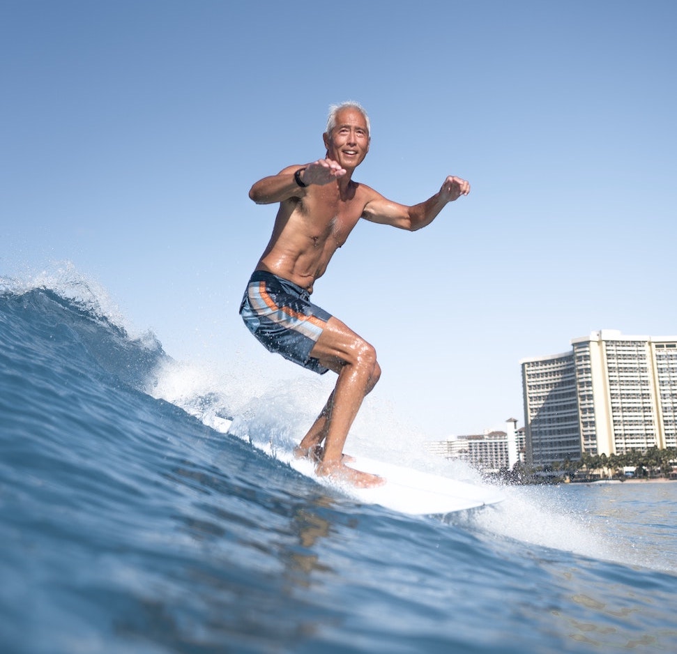Original Alignment and Aging senior man surfing